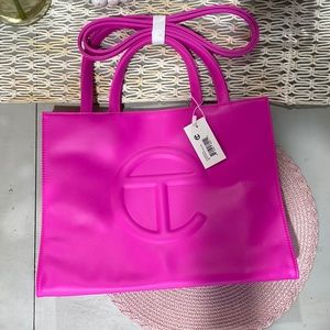 Telfar medium size. New with tags and dust bag. Azalea color. 100% authentic